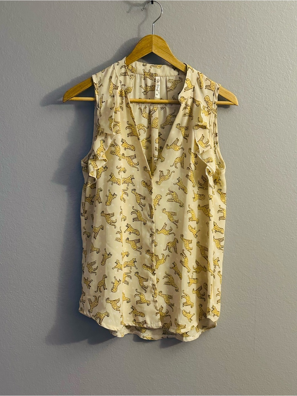 Sleeveless Cream Leopard Print V-Neck Blouse
